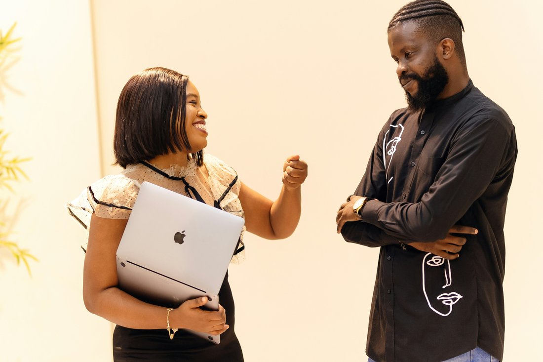 Two colleagues in conversation